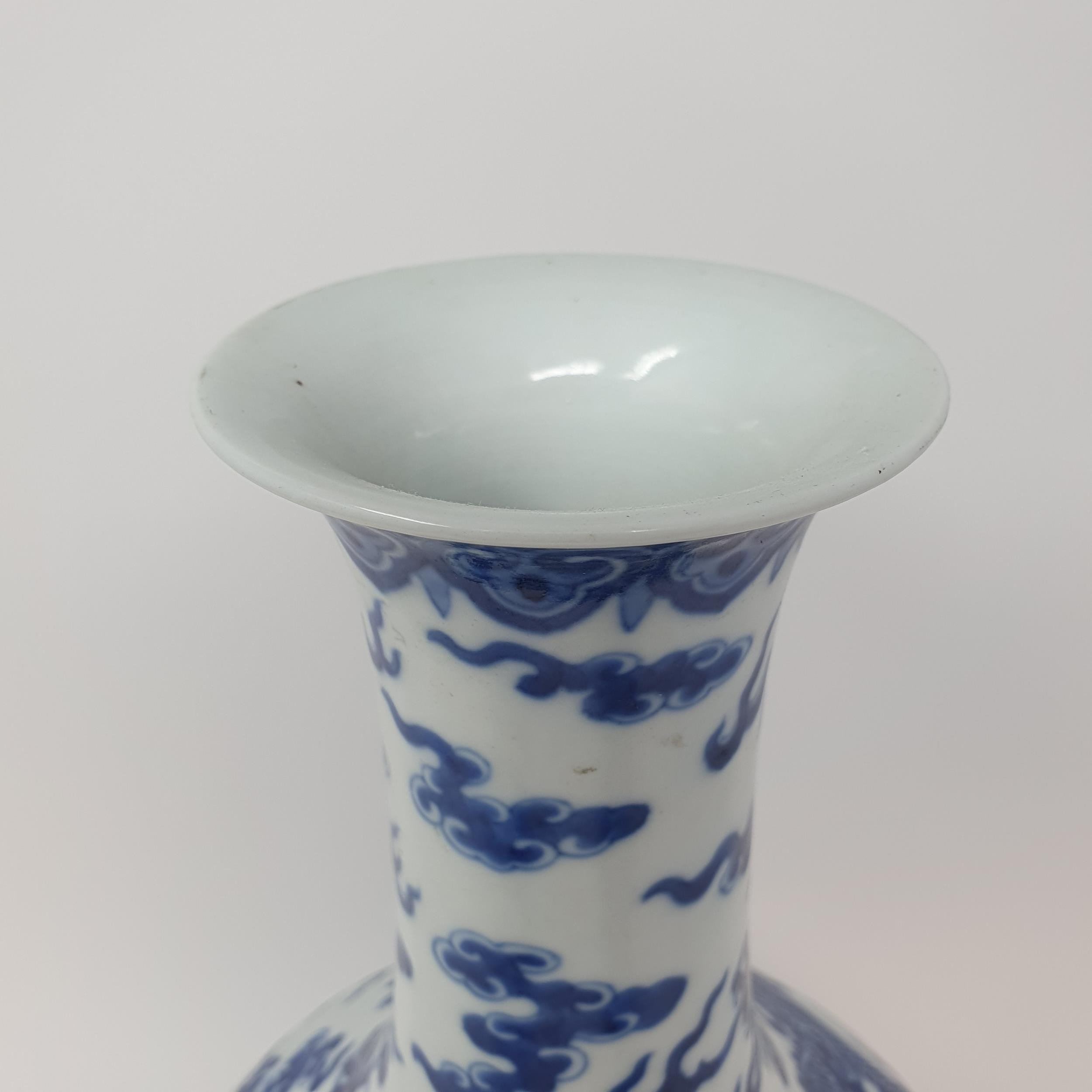 A Chinese underglazed blue and white vase, decorated dragons, 35 cm high Some firing faults, a - Image 7 of 10