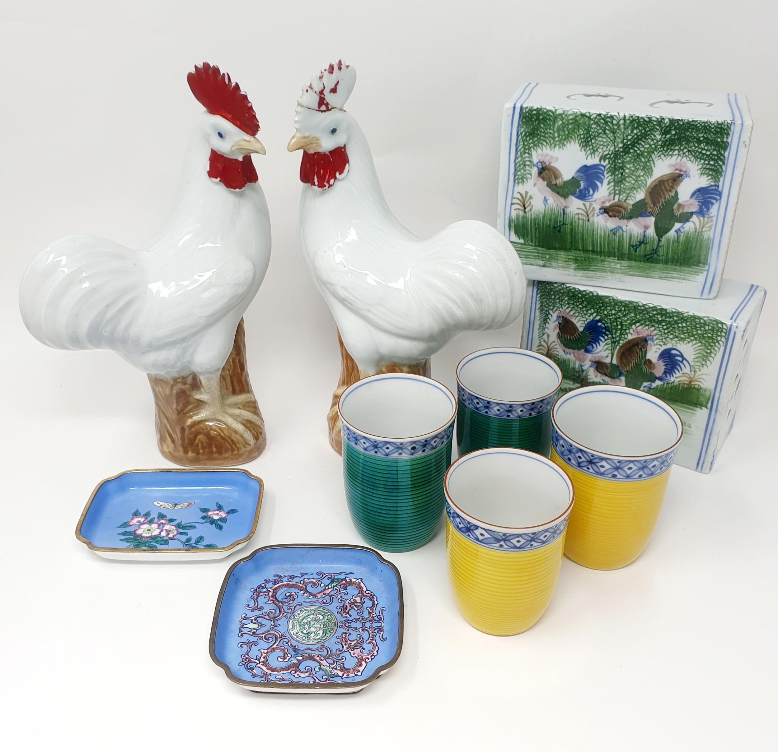 A pair of Chinese cockerels, 25 cm high, two cushions, four beakers and two enamel dishes (10) - Image 2 of 4