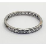 A diamond eternity ring, ring size L 1/2