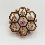 A yellow metal, diamond and ruby brooch