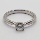 An 18ct white gold and diamond solitaire ring, ring size N