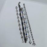 A silver and blue stone bracelet, and assorted other bracelets