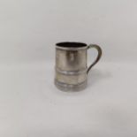 A Victorian silver novelty shot, in the form of a tankard, London 1890