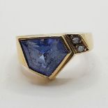 An 18ct gold, blue tanzanite and diamond ring, ring size H Provenance: From a large single owner