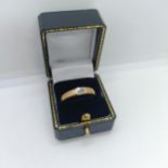 A diamond four stone ring, ring size M