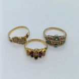 A 15ct gold and red stone ring, ring size N, and two other rings (3)