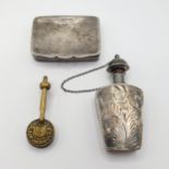 A Continental silver perfume bottle, a snuff box and a clip