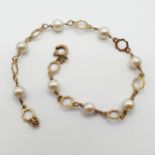 A 9ct gold and pearl bracelet Provenance: From a large single owner collection of jewellery