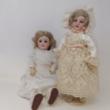 A French bisque headed doll, makers mark SFBJ Paris, with millefiori closing glass eyes and a