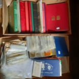 A large quantity of assorted stamps, loose and in albums (2 large boxes)