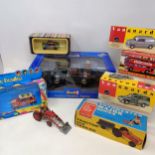 A Farm King model tractor No. 1258 boxed, a Vanguard model, No. VA14011 and VA11009 and assorted toy