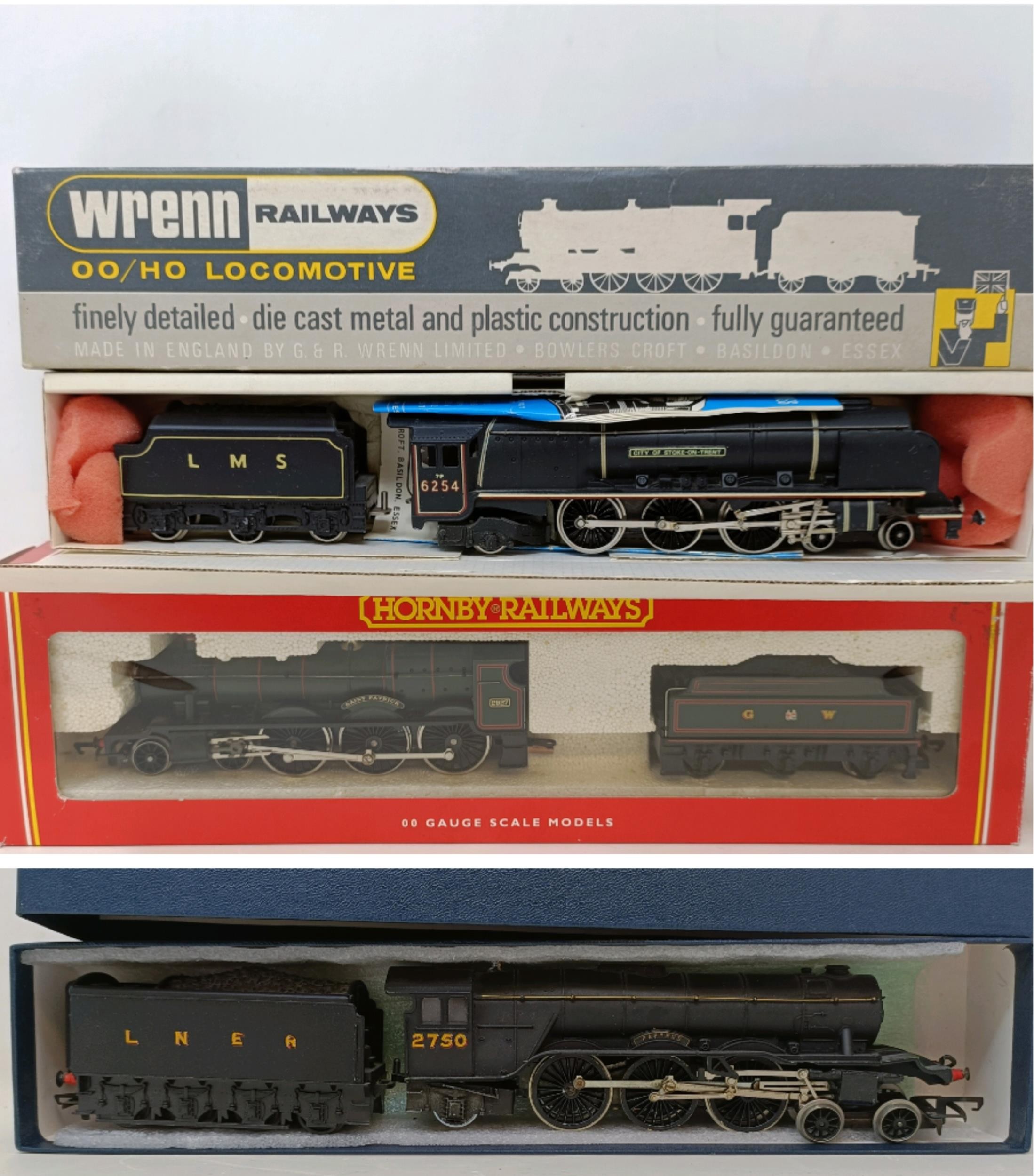 A Wrenn OO gauge 4-6-2 locomotive and tender, No. W2227, a Hornby OO gauge 4-6-0 locomotive and