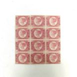 A block of twelve QVR 1/2d rose red stamps some perferations not joined and some creases