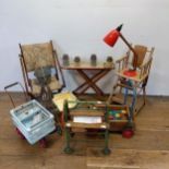 A child's Tri-ang Mandolin, a doll's highchair, a push-along toy with bricks, a child's ironing