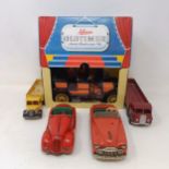 A Schuco Tacho-Examico 4002 toy car, Schuco Akustico 2202, a reproduction Schuco Oldtimer boxed, and