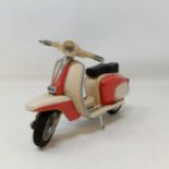 A model of a Lambretta 9 cm high, no engine/motor to drive, plastic, no markings/country of origin