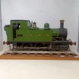 A live steam 3.5 inch gauge 0-6-0 locomotive, in green livery, 50 cm, on a stand no papework or