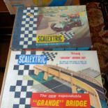 A Scalextric set No 31, a Grand Bridge, two Meccano sets, and assorted other toys, all boxed Boxes