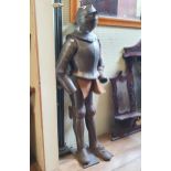 A suit of armour, on a stand approx. 178 cm high, no history or provenance, general light surface