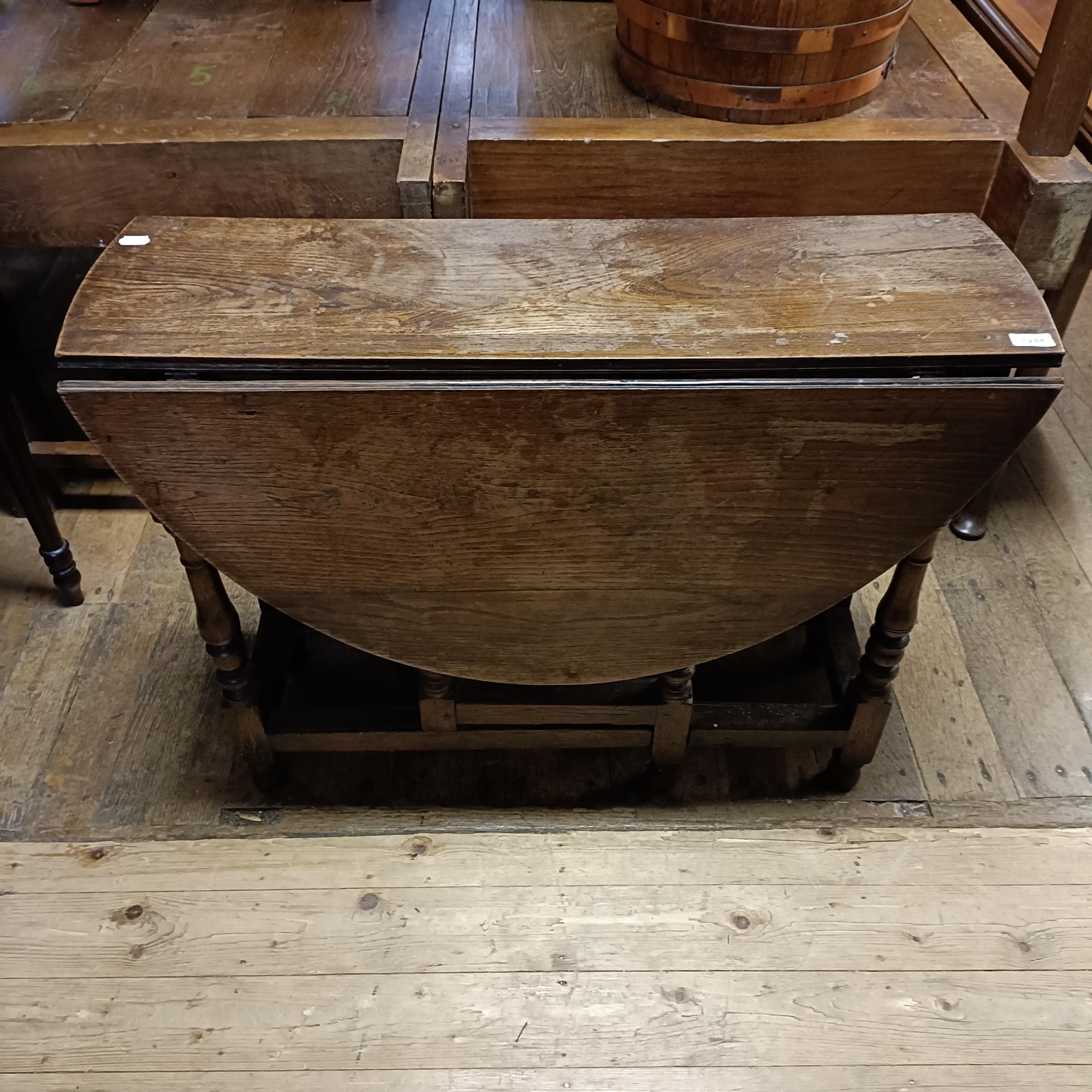 A 19th century oak gateleg table, 100 cm wide