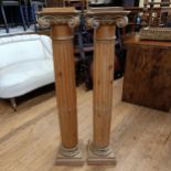 A pair of pine pedestals in the form of Corinthian columns, 114 cm high