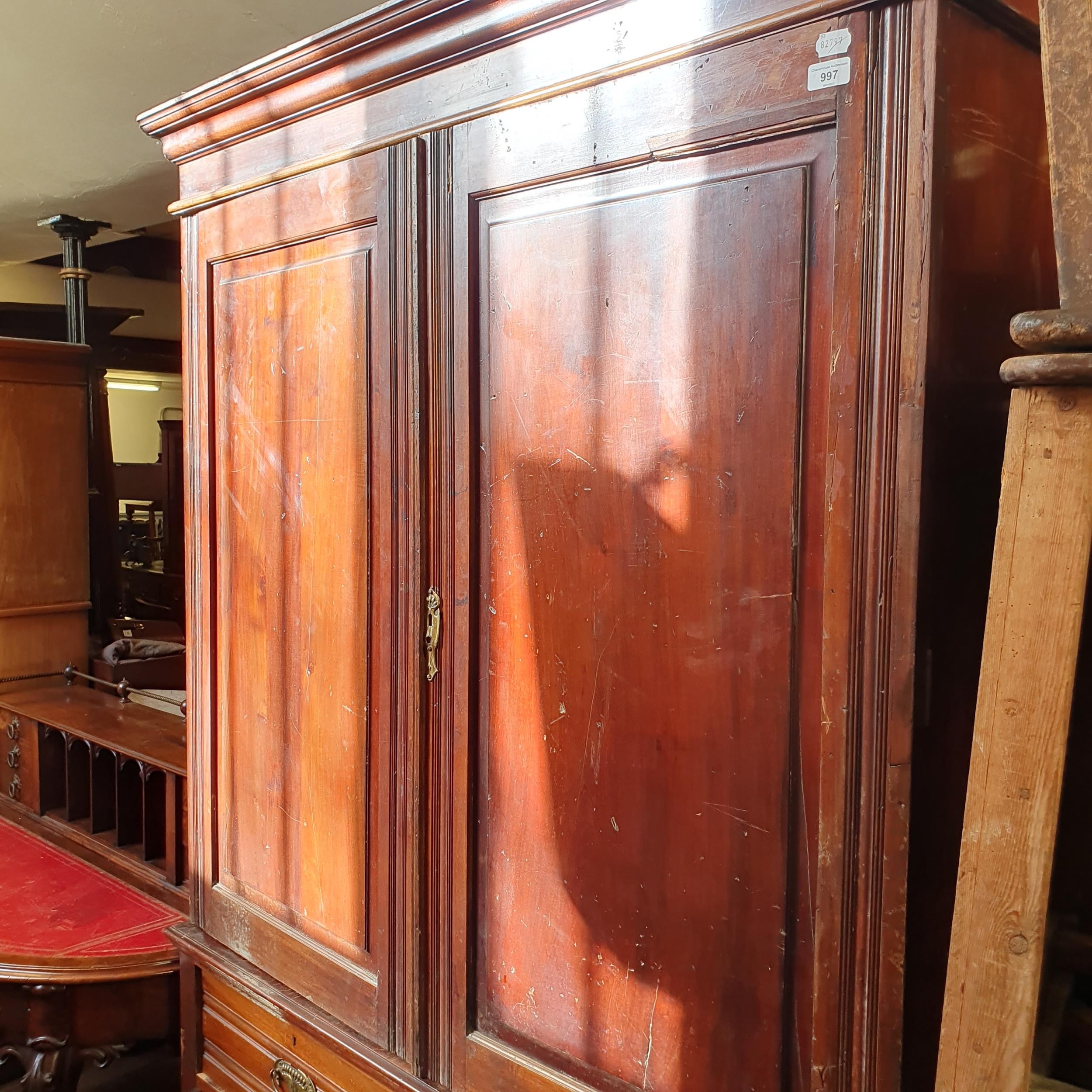 A walnut linen press, 128 cm wide In need of restoration, has been outside - Image 4 of 5