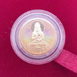 A 2003 Kuanyin commemorative hologram gold coin, No 00097, cased