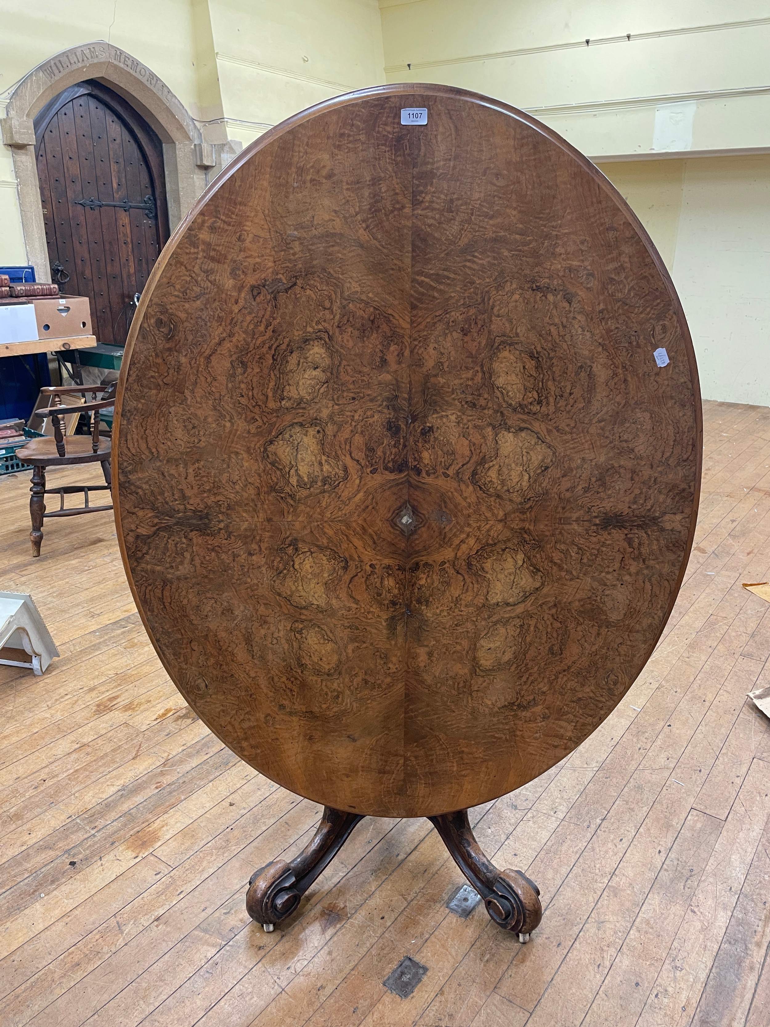 A Victorian inlaid walnut oval loo table, 140 cm wide