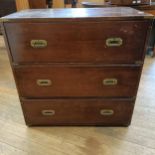 A mahogany and brass bound campaign style chest, having three drawers, 80 cm wide