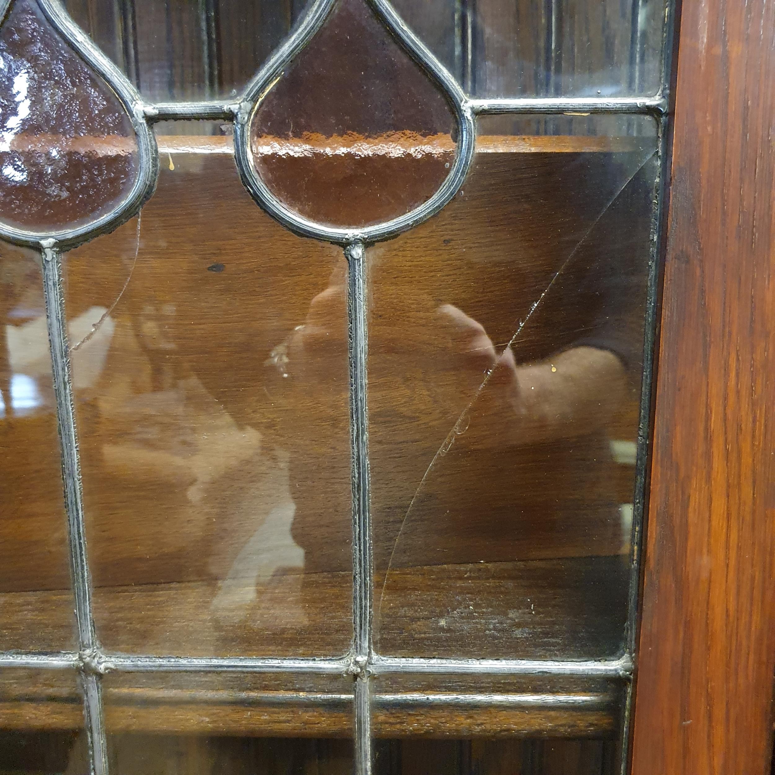 An early 20th century oak bookcase, with leaded glazed panels, 180 cm high x 92 cm wide - Image 3 of 3