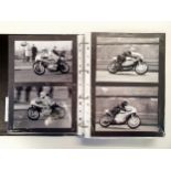 An album of 134 motorcycle racing photographs and images, 1970-1979, three signed, an album of 63