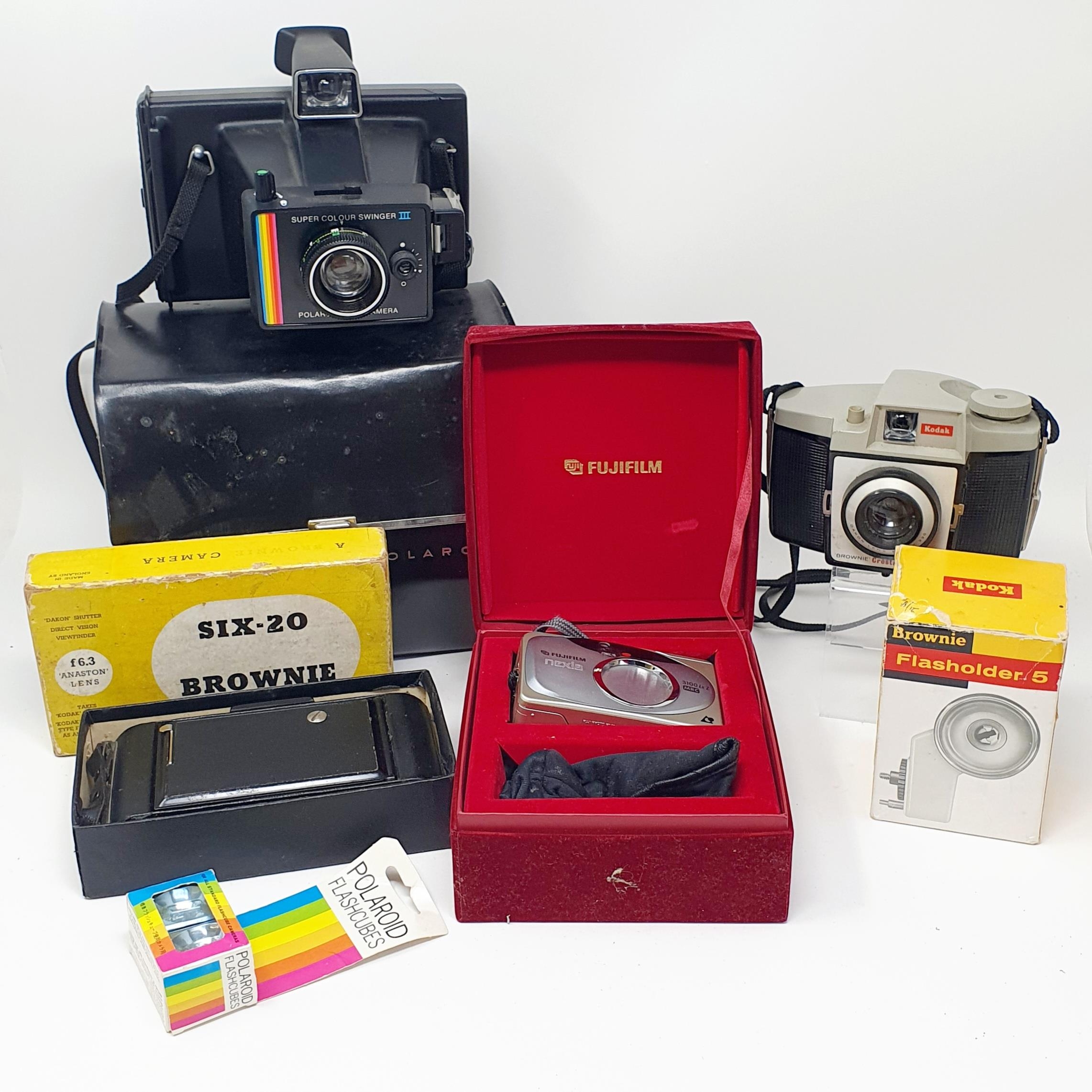 A Yashica camera, and assorted photographic equipment (box)