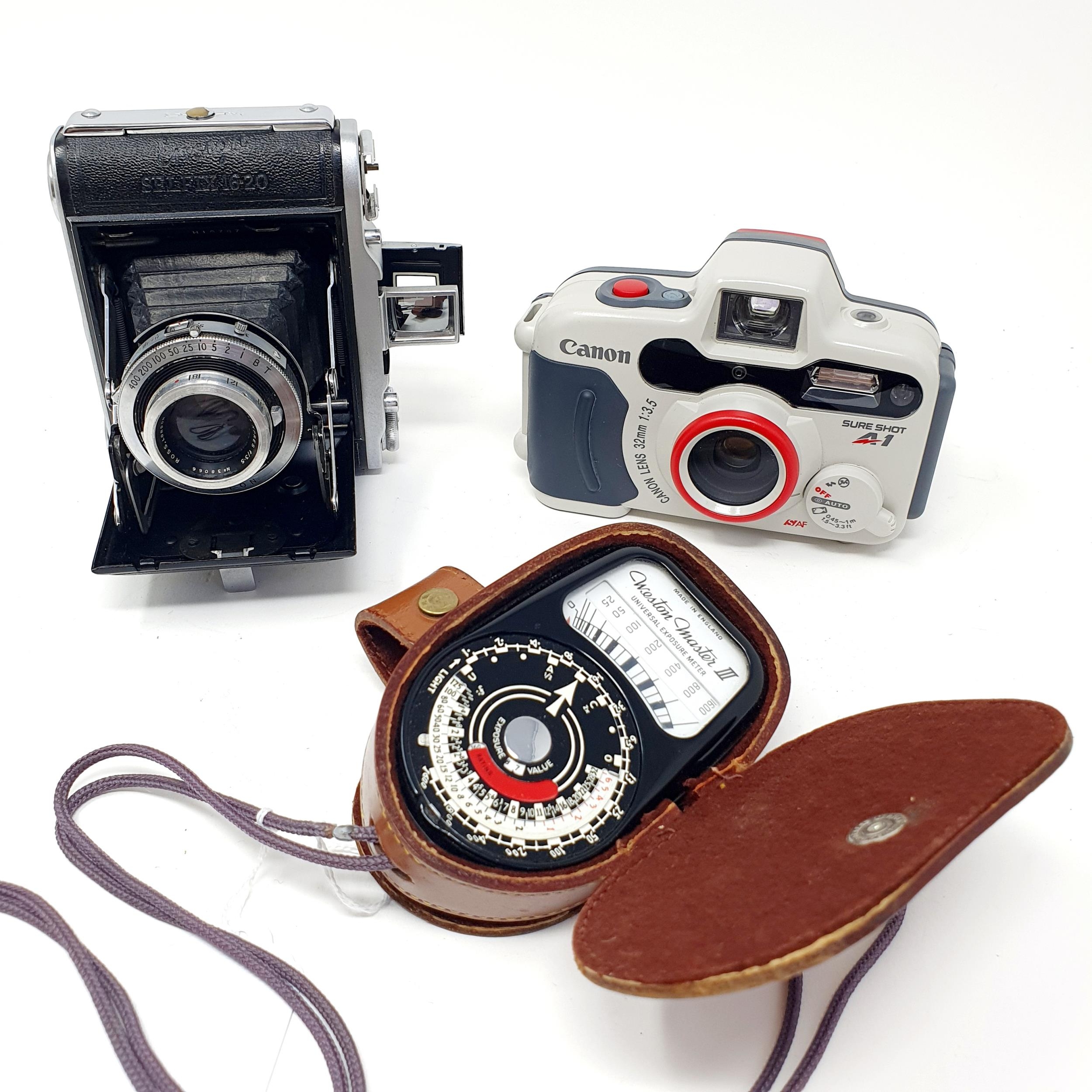 An Ensign Selfix 16-20 camera, in a leather carry case, an Ensign Weston Master III light meter in