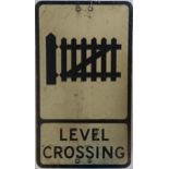 A road sign, Level Crossing, 53.5 x 30.5 cm Generally scratched