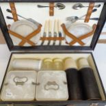 A picnic set, in a case with basket weave style decoration, little used, 50 cm wide