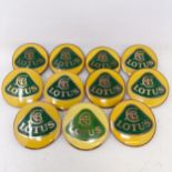 Eleven Lotus enamel badges