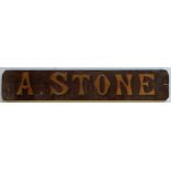 A painted wood advertising sign, A Stone, 17 x 92 cm