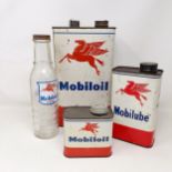 A Mobiloil Vacuum oil glass bottle, two Mobiloil cans, and a Mobilube can (4)