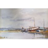 Edward Wesson (British 1910-1983), Boats at low tide, watercolour, signed, 32 x 49 cm Provenance: