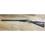 A 12 bore double barrel shotgun, by T Page Wood Note: Buyers will be asked to show their valid