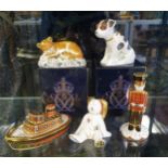 A Royal Crown Derby paperweight, Lion Cub, 5 cm high, boxed, Sitting Puppy, 8 cm high, boxed,