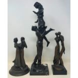 A 20th century bronze group of two dancers, on a polished slate base, 43 cm high, and two others (3)