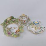 A Coalport basket decorated flowers, 20 cm wide, a cup and cover, and a chamber stick (3)