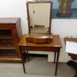 A mahogany bedroom mirror, the base with three drawers, and a mahogany side table (2)