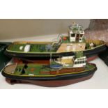 A model of a tug boat, 80 cm wide, and another, 60 cm wide (2)