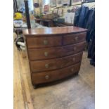A mahogany bow front chest, having two short and three long drawers, 108 cm wide, a mahogany