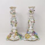 A pair of Coalport candlesticks, decorated flowers, 25 cm high (2)