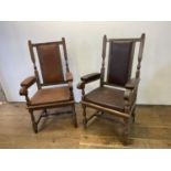 A pair of oak armchairs, with padded backs, arms and seats (2)