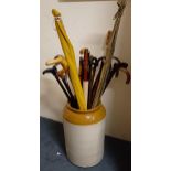 Assorted walking sticks, in a large earthenware pot (qty)