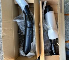 A pair of Honda new old stock silencers, and other Honda new old stock parts Being sold without